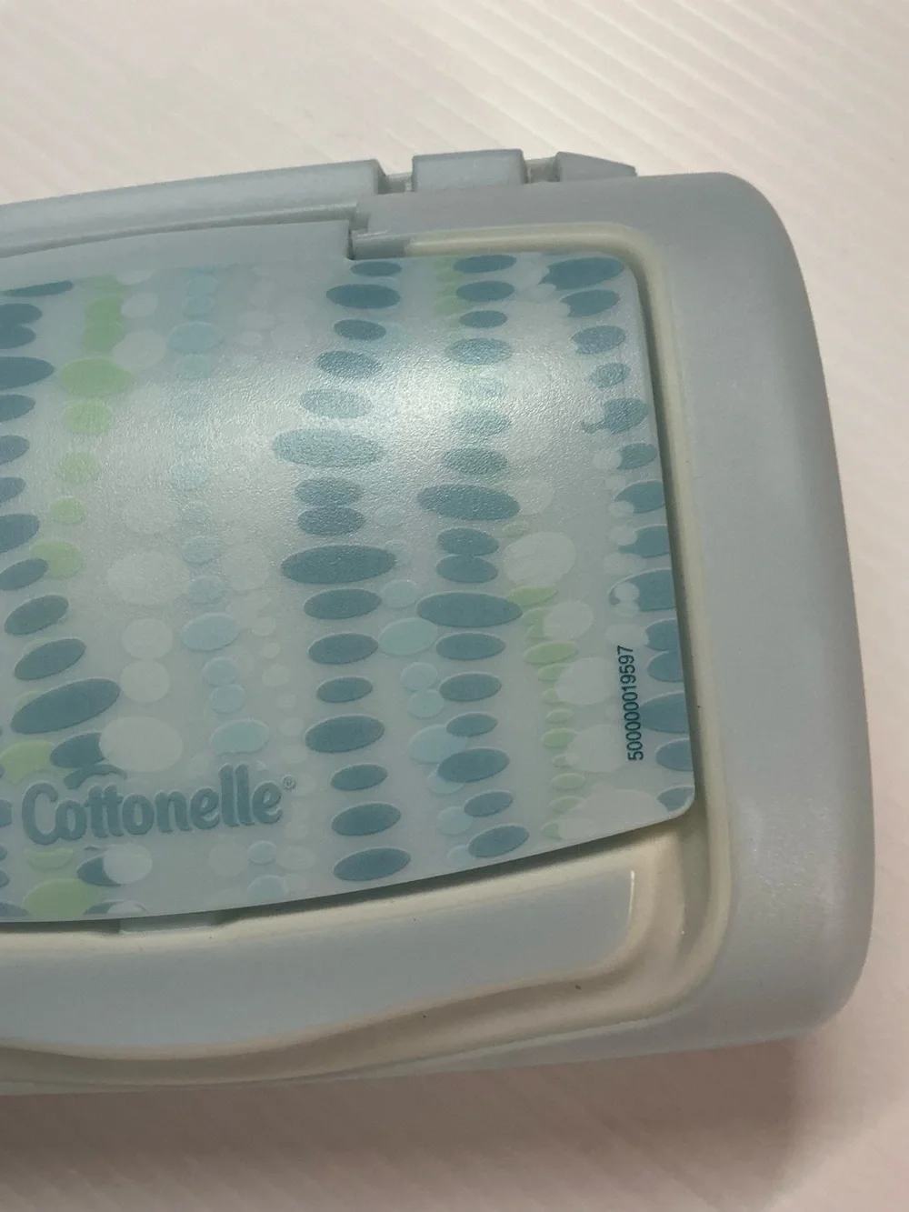 Cottonelle Mostly Colored Blue w/ Green with Word Logo Print Top Pop-Up Dispense